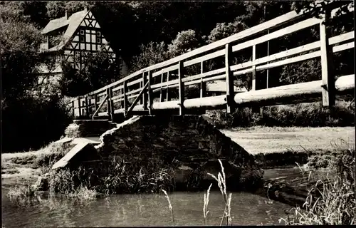 Ak Kirchähr Gackenbach im Westerwald, Karlsheim, Blick auf Haus und Brücke, Gewässer