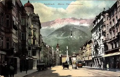 Ak Innsbruck in Tirol, Maria-Theresienstraße, Straßenbahn, Litfaßsäule, Kutschen