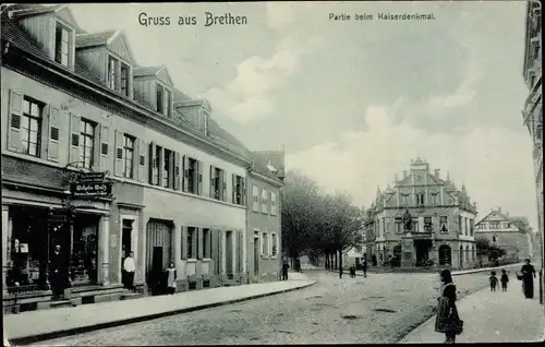 Ak Bretten in Baden, Straßenpartie beim Kaiserdenkmal, Geschäft