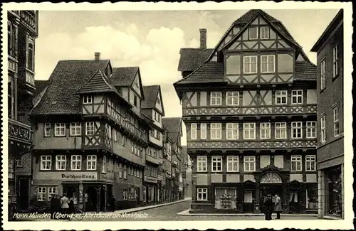 Ak Hann. Münden in Niedersachsen, Alte Häuser, Marktplatz, Buchhandlung
