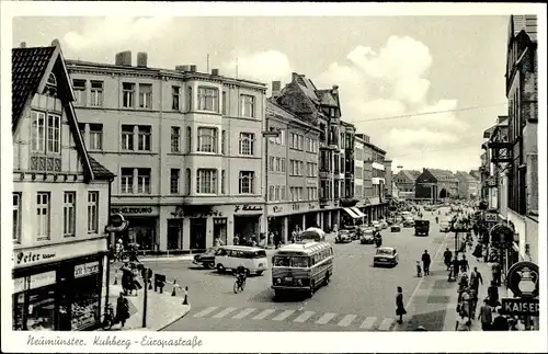 Ak Neumünster in Holstein, Kuhberg Europastraße, Omnibus, Autos, Geschäfte, Kaisers