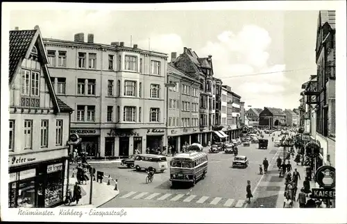 Ak Neumünster in Holstein, Kuhberg Europastraße, Omnibus, Autos, Geschäfte, Kaisers