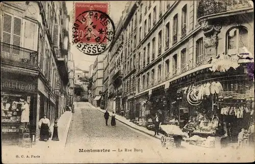 Ak Paris XVIII Montmartre, la Rue Burq, Geschäft mit Auslagen, Schaufenster, Passanten