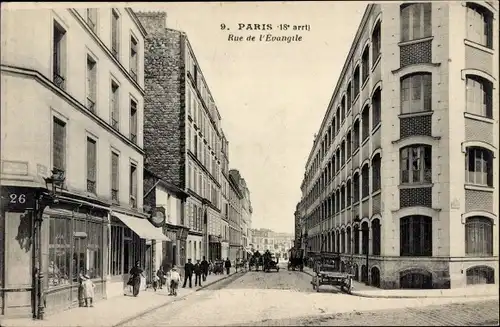 Ak Paris XVIII, Rue de l'Evangile, Fuhrwerke, Pasanten, Friseurladen