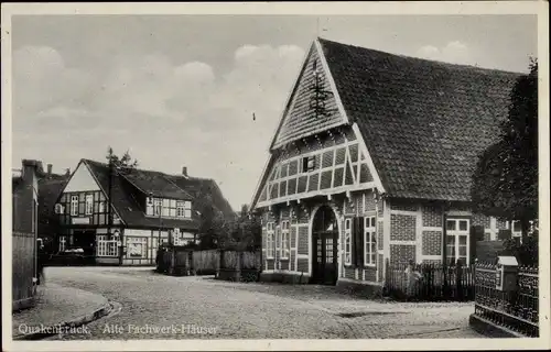 Ak Quakenbrück in Niedersachsen, alte Fachwerkhäuser, Dorfpartie