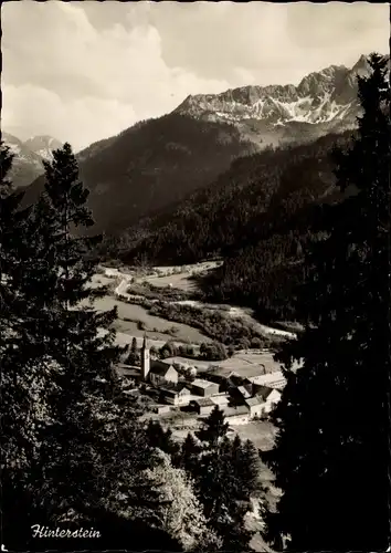 Ak Hinterstein Bad Hindelang im Oberallgäu, Durchblick zum Ort, Alpen mit Pfannenhölzern