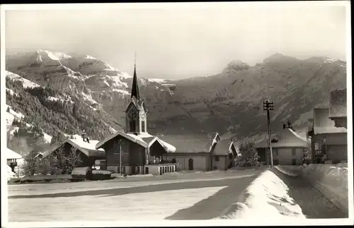 Ak Lenk Kanton Bern, Winterlandschaft, Ortspartie, Kirche