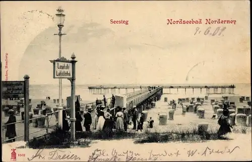 Ak Norderney in Ostfriesland, Blick auf den Seesteg, Strandkörbe