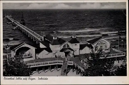 Ak Ostseebad Sellin auf Rügen, Blick auf Seebrücke und Strand