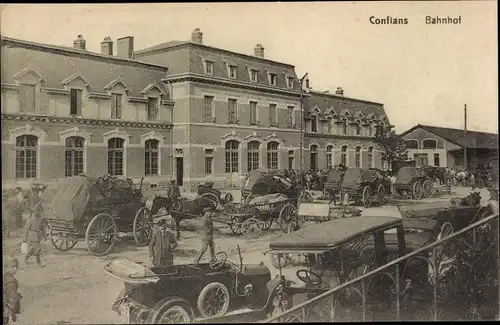 Ak Conflans Meurthe et Moselle, Bahnhof, deutsche Armeefuhrwerke, 1. WK
