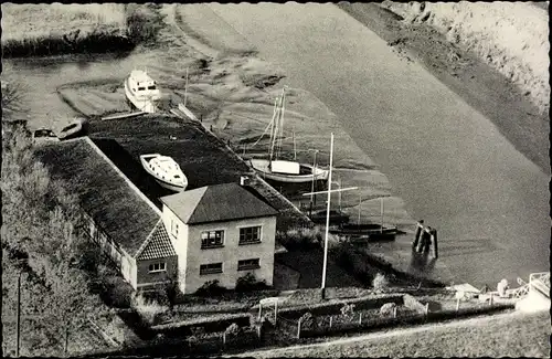 Ak Weener Ostfriesland, Haus aus Vogelschau, Boote