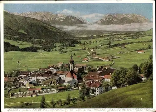 Ak Reit im Winkl Oberbayern, Gesamtansicht vom Ort mit Kirche, Kaisergebirge im Hintergrund