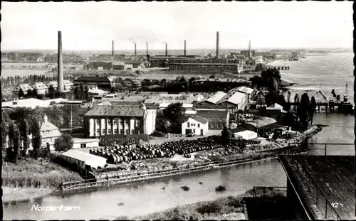 Ak Nordenham in Oldenburg Niedersachsen, Industriegebäude, Hafenanlagen, Lager