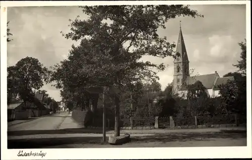 Ak Süderbrarup in Schleswig Holstein, Straßenpartie, Kirche