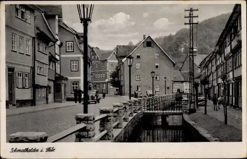 Ak Schmalkalden im Thüringer Wald, Straßenpartie mit Wasserlauf