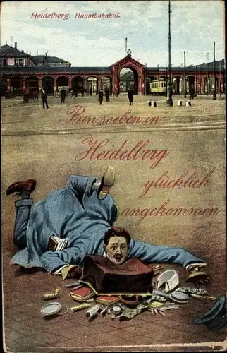 Ak Heidelberg am Neckar, Hauptbahnhof, gestürzter Mann, offene Reisetasche, glückliche Ankunft
