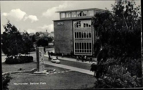 Ak Neumünster in Holstein, Berliner Platz, AEG-Gebäude