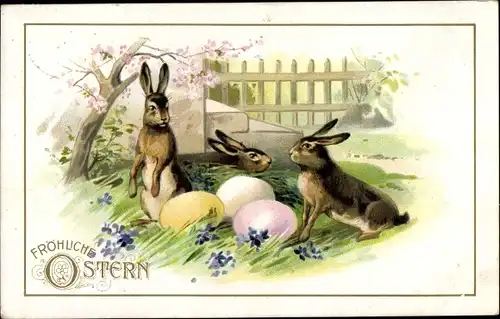 Präge Ak Glückwunsch Ostern, Osterhasen mit Ostereiern