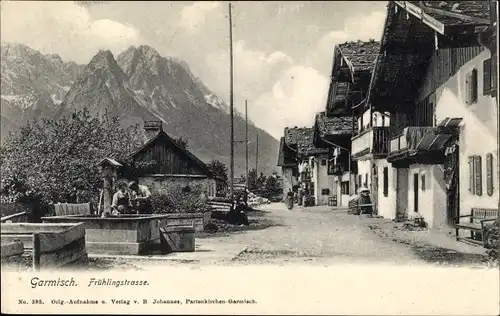 Ak Garmisch Partenkirchen in Oberbayern, Blick in die Frühlingstraße, Gebirge