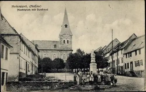 Ak Holzappel im Rhein Lahn Kreis, Partie am Marktplatz mit Denkmal