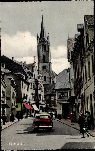 Ak Hermeskeil in Rheinland Pfalz, Straßenpartie, Kirche, Geschäfte