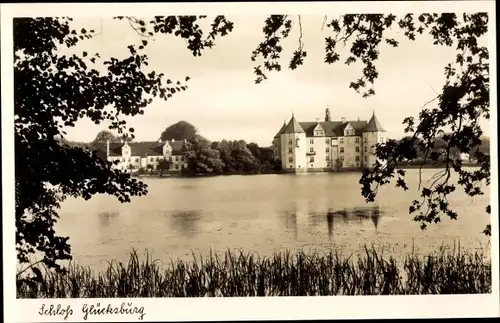 Ak Glücksburg an der Ostsee, Blick aus der Ferne auf Schloss Glücksburg