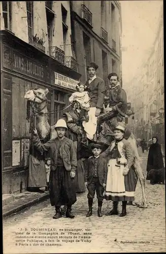 Ak Männer auf einem Kamel reitend, Kinder, J. B. Doussineau, Stadtansicht