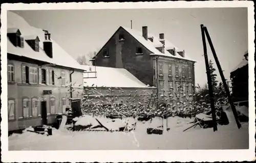 Foto Ak Cagny les Amiens Somme, Ortsansicht, Winterszene, Wohnhäuser