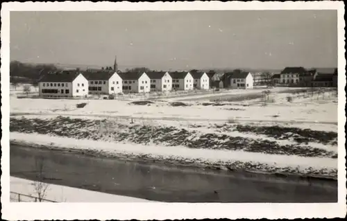 Foto Ak Cagny les Amiens Somme, Blick auf den Ort, Winterszene, Häuser