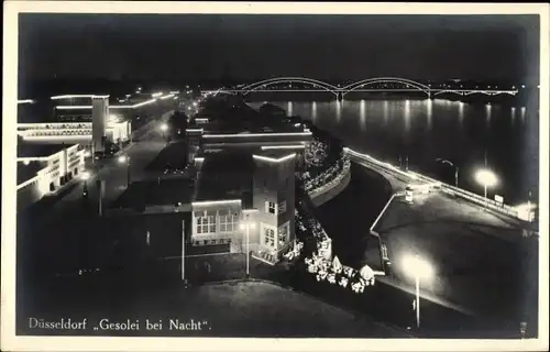 Ak Düsseldorf am Rhein, Gesolei bei Nacht, Rheinbrücke, Uferpartie