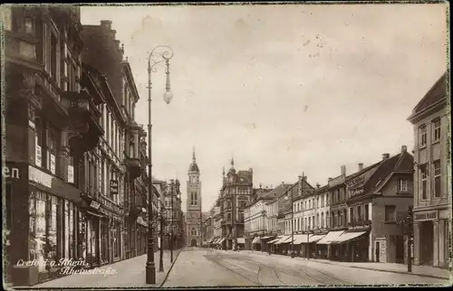 Ak Krefeld am Niederrhein, Blick in die Rheinstraße, Kirchturm, Geschäfte