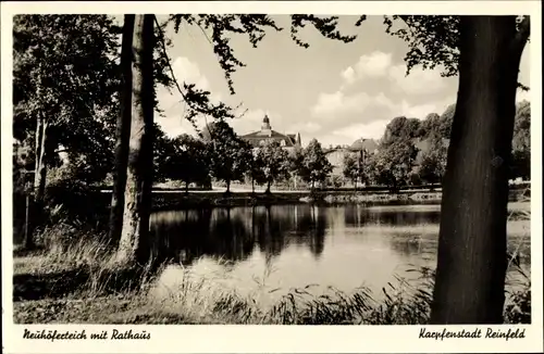 Ak Reinfeld in Holstein, Neuhöferteich mit Rathaus