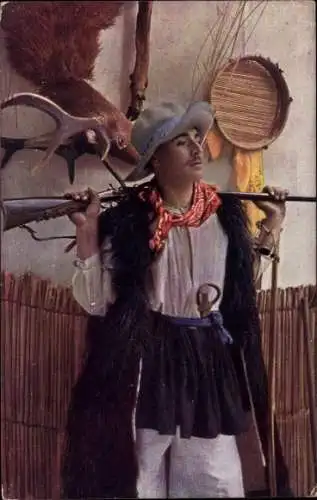 Ak Jäger mit Gewehr und Jagdtrophäen