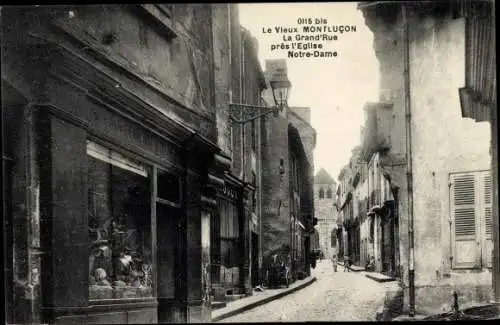 Ak Montluçon Allier, La Grande Rue pres l'Eglise Notre Dame