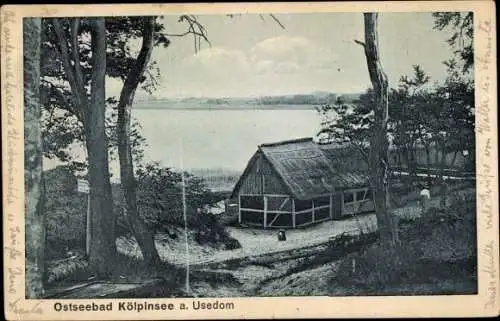 Ak Ostseebad Kölpinsee auf Usedom, Hütten am Wasser