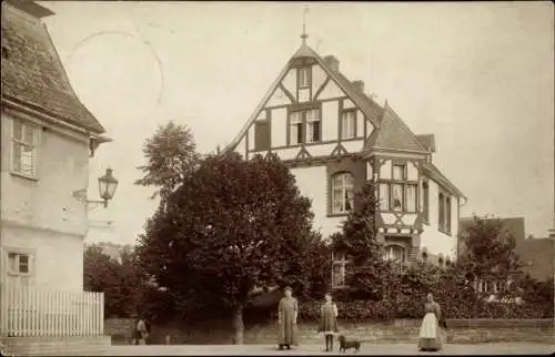 Foto Ak Bokel bei Rendsburg, Straßenpartie, Fachwerkvilla