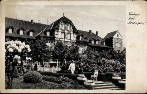 Ak Dreibergen Bad Zwischenahn Kreis Ammerland, Blick auf das Kurhaus, Gartenpartie