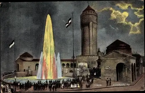 Mondschein Ak Düren im Rheinland, Leuchtfontaine, Beleuchteter Springbrunnen, Turm