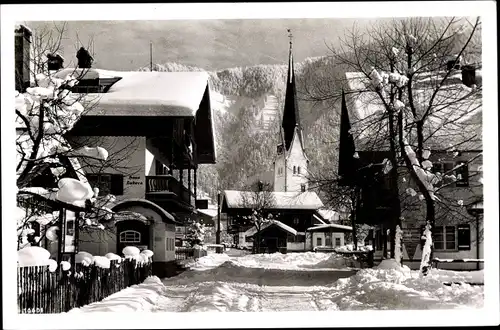 Ak Bayrischzell im Mangfallgebirge Oberbayern, Dorfpartie im Winter, Haus Lubeca