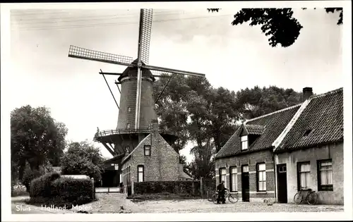 Ak Sluis Zeeland, Molen, Windmühle, Wohnhäuser, Fahrräder