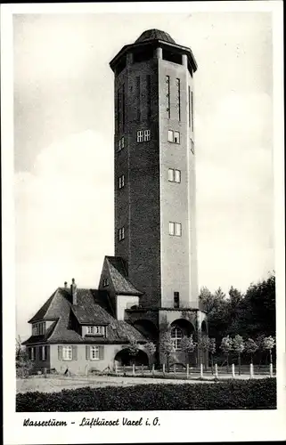 Ak Varel am Jadebusen, Straßenpartie mit Blick auf den Wasserturm