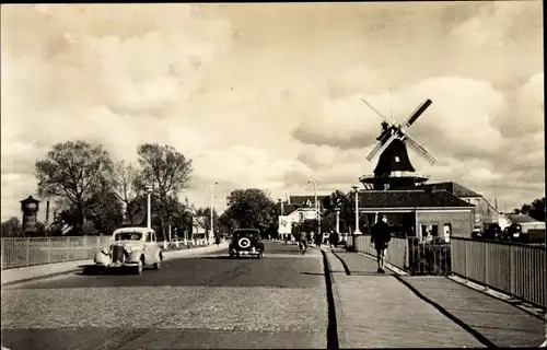 Ak Norden Niedersachsen, Partie auf der Mühlenbrücke, Windmühle