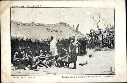 Ak Elfenbeinküste, Indigenes du Baoule buvant du vin de palme