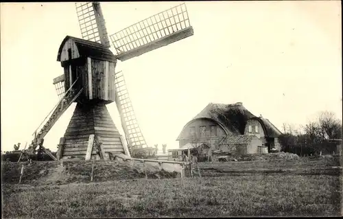 Ak Belgien, Blick auf eine Windmühle, Wohnhaus