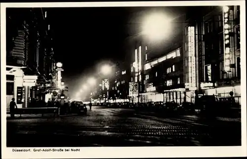 Ak Düsseldorf am Rhein, Graf Adolf Straße bei Nacht