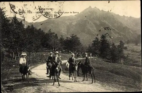 Ak Le Mont Dore Puy de Dôme, En route pour le Sancy, anes, Reiter auf Eseln