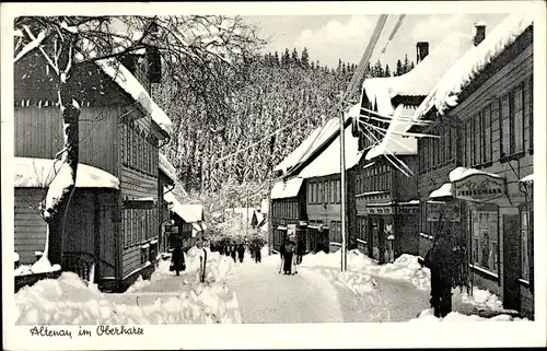 Ak Altenau Clausthal Zellerfeld im Oberharz, Straßenpartie im Winter, Skifahrer