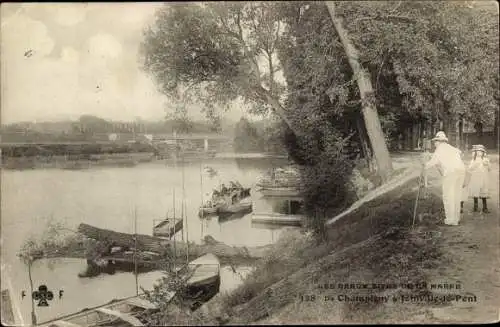 Ak Champigny Joinville le Pont Val-de-Marne, Mann mit Fotoapparat am Flussufer