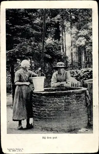 Ak Niederlande, Bij den put, Wasserschöpfer