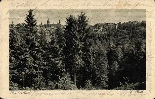 Ak Freudenstadt im Nordschwarzwald, Blick auf den Wald mit Ort im Hintergrund